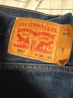 Levi's Men's Straight Jeans in Dark Blue Denim with Tan Patch